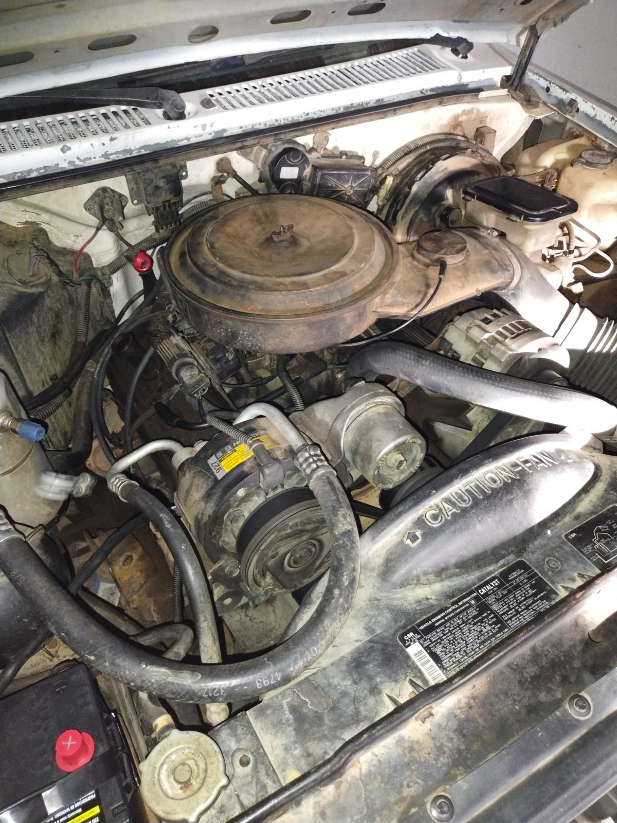 Mobile mechanic testing a car battery and starting system in Austin
